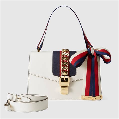 gucci sylvie white and red|Gucci leather shoulder bag.